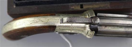 A cased percussion pepperbox six barrelled revolver, 7.75in.
